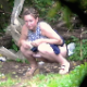 An attractive, Eastern-European woman is voyeuristically recorded taking a piss and a shit in an outdoor location that appears to common dumping area for others. Presented in 720P HD. About 2 minutes.